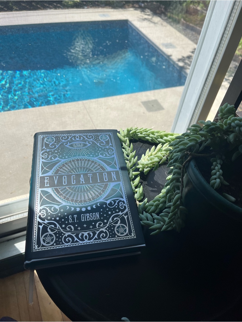 Evocation by S.T. Gibson - Blue with Silver Foil Hardcover, Owlcrate Edition